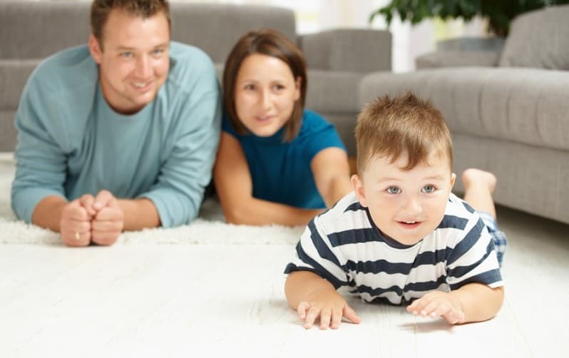 bigstock-Happy-family-lying-on-floor-in-13094744-800x533